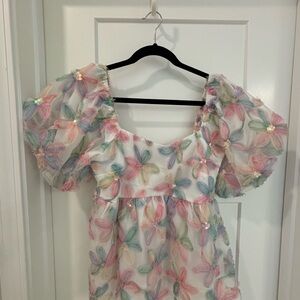 Puffy sleeve appliqué flowers and sequin top